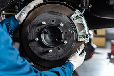 Fresno mechanic works on brake repairs